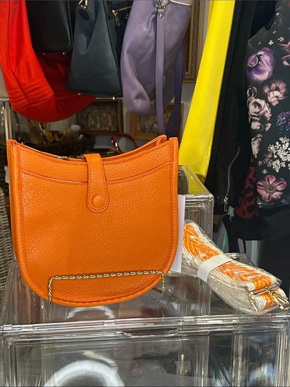 Calin Orange Pebbled Vegan Leather Crossbody with Guitar Strap 8”x 2.25”x 7” NWT